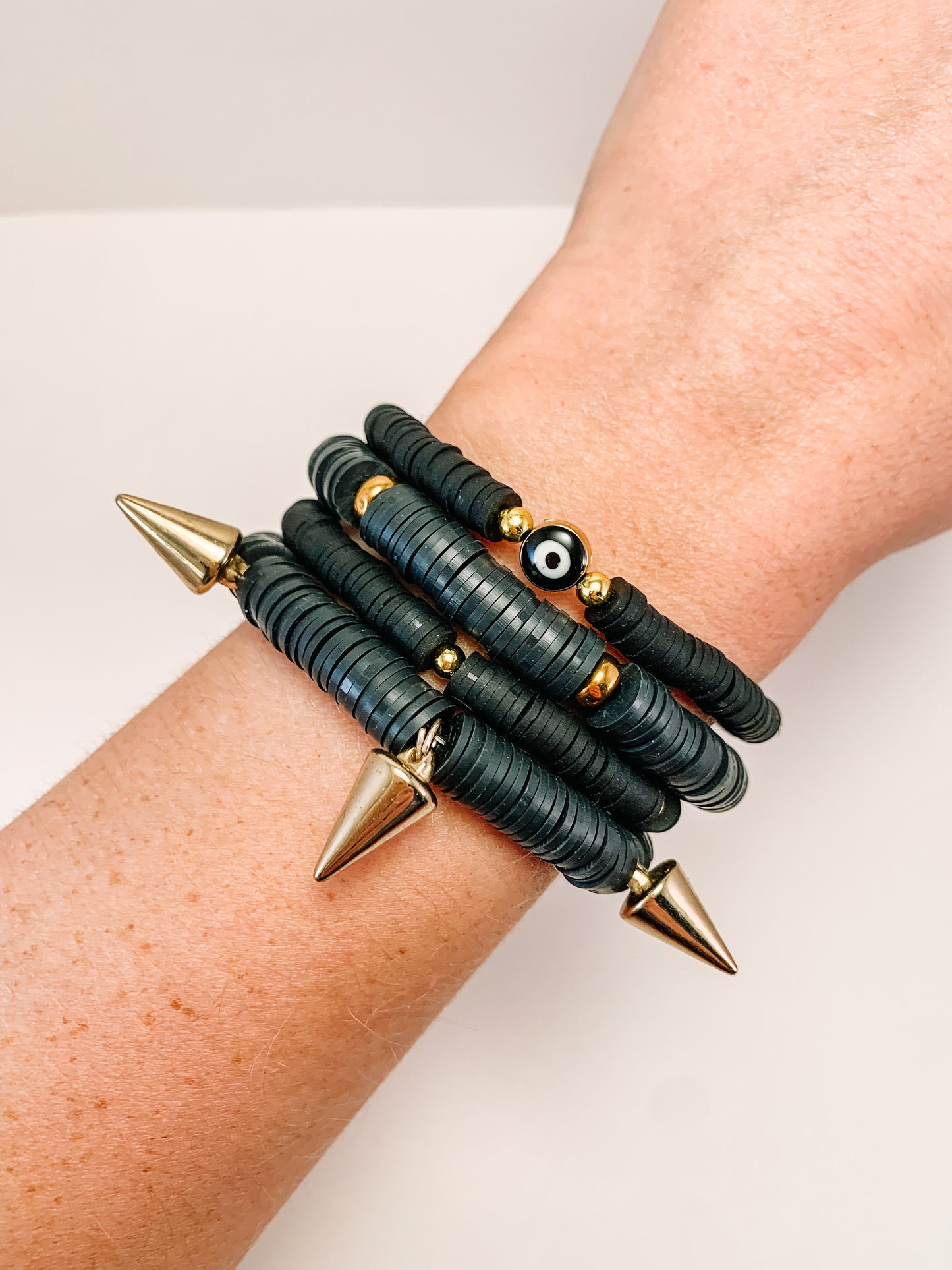 black Heishi bracelet stack